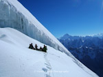 High Altitude Porters resting at 6100m on Cathedral Peak, Karakoram, Pakistan.