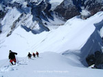 Descending the summit slopes of of 6247m Cathedral Peak, Karakoram, Pakistan.