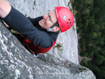 Ian Whitehead fights for the last moves on The Split Pillar, 5.10b. Grand Wall, Squamish Chief, British Colombia.