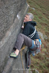 Mike Redmayne on the crux of Dark Continent, E1 5c, Stanage Edge, England.