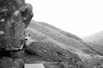 Dave MacLeod bouldering in the Llanberis Pass. North Wales.